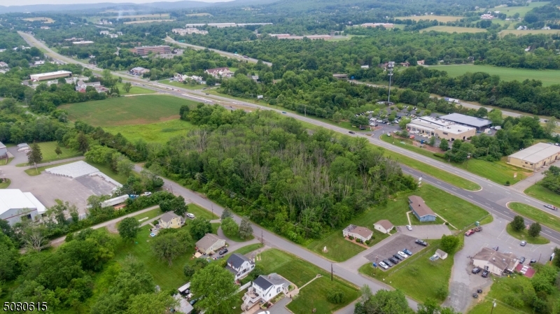 1121 Highway 22 Lebanon, NJ 08833 - Photo 5 of 11 an aerial view of city lake and trees all around