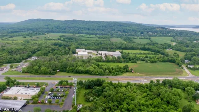 an aerial view of a golf course with green space