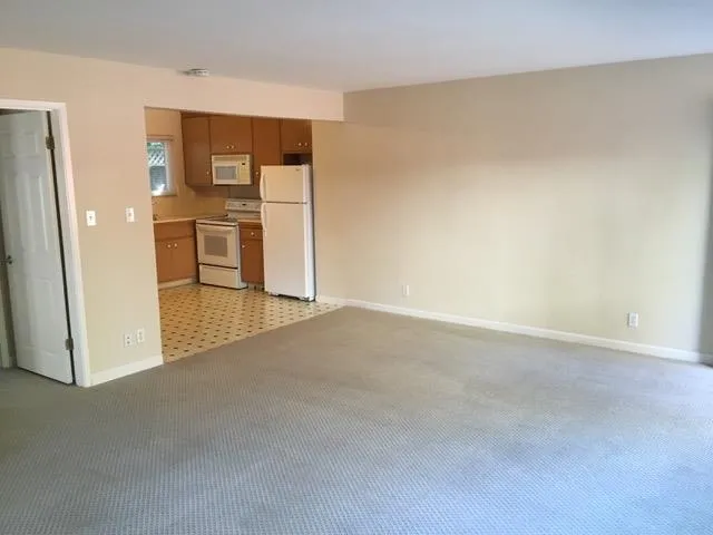 a view of a kitchen with a sink