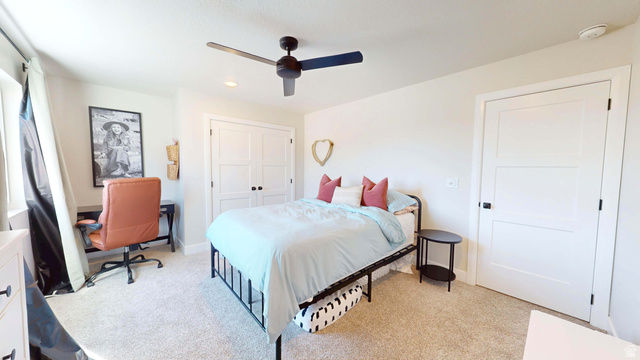 1127 4240 North Enoch, UT 84721 - Photo 38 of 56 Bedroom featuring a desk, ceiling fan, light colored carpet, a closet, and recessed lighting