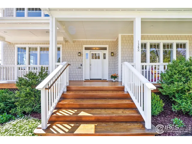a view of a house with wooden stairs