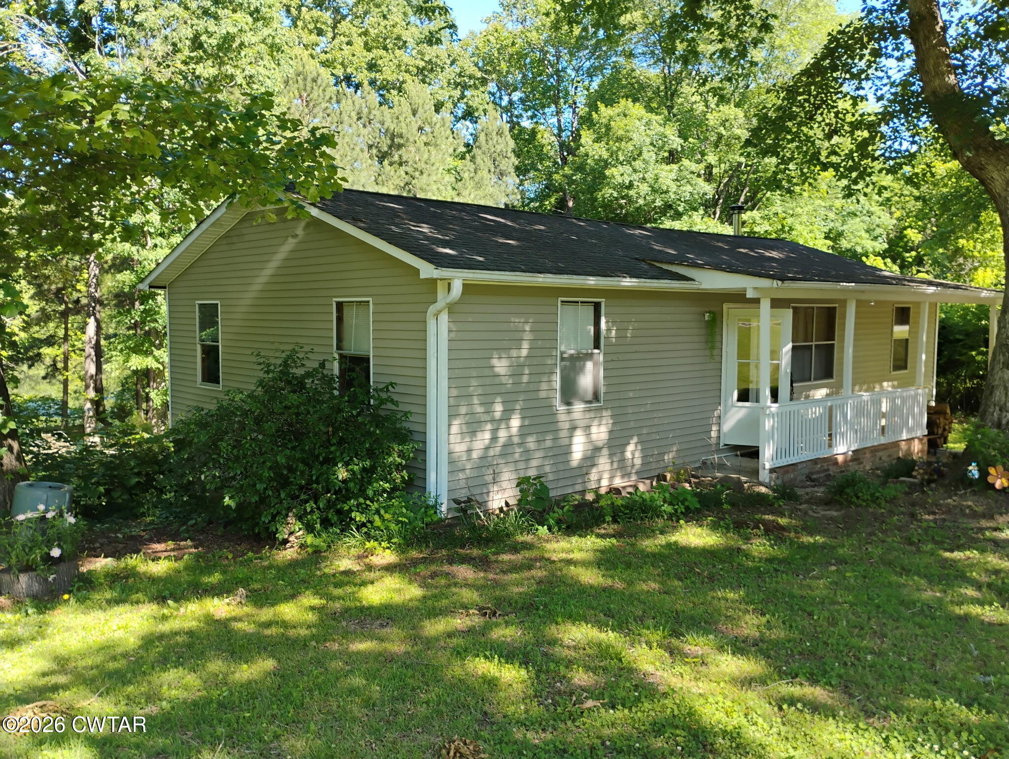 195 Ridge Road Medina, TN 38355 - Photo 1 of 14 a front view of house with yard and green space