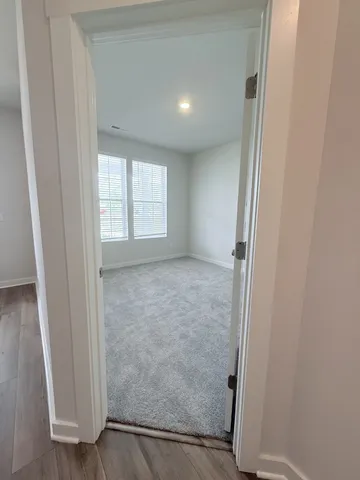 an empty room with windows