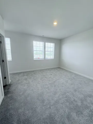 a stove top oven sitting inside of a kitchen