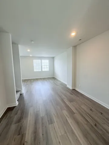 a bathroom with a sink a toilet and bathtub