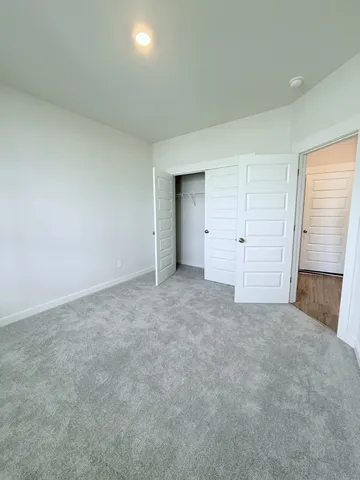 an empty room with a fireplace