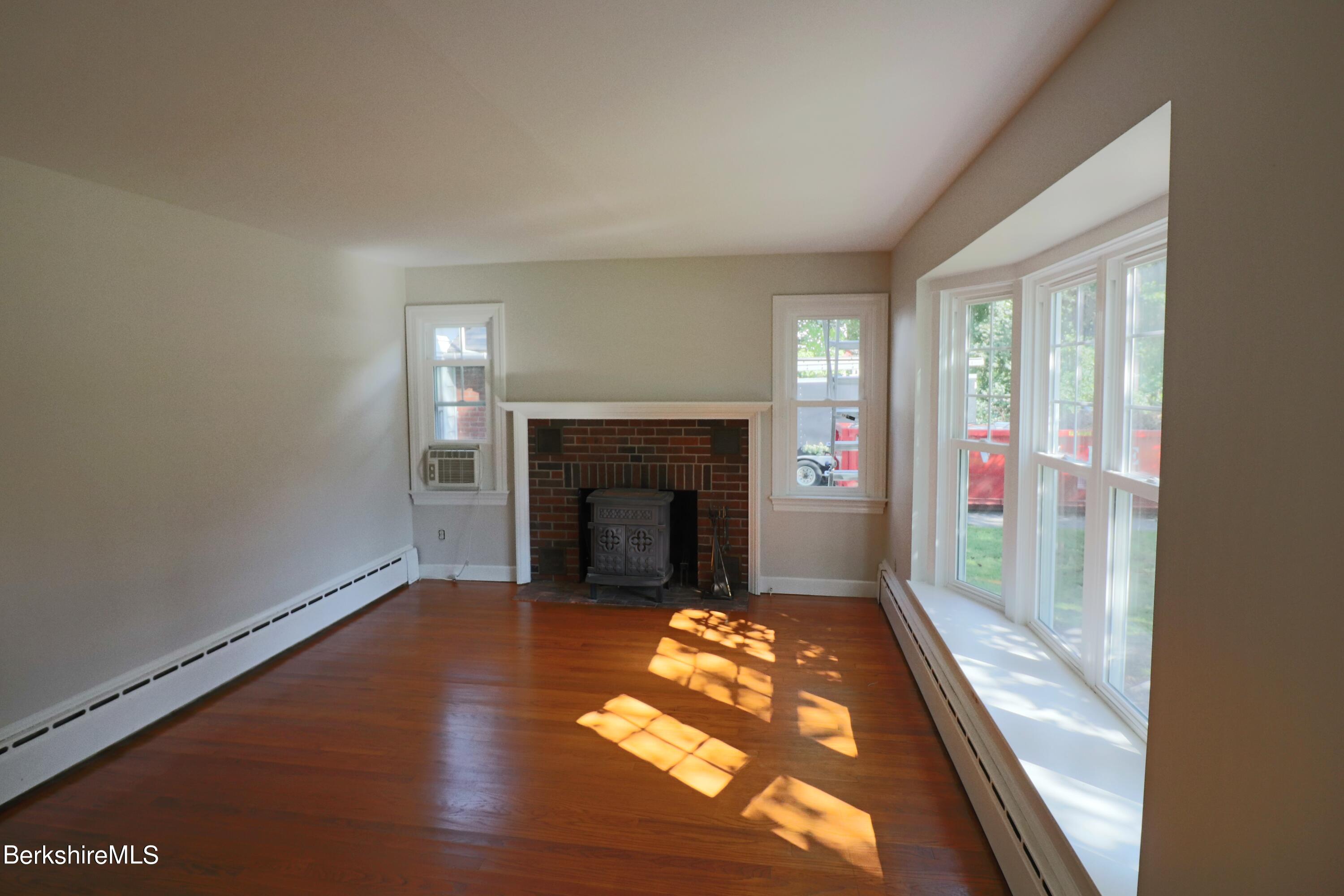253 State Road Great Barrington, MA 01230 - Photo 16 of 36 LR fresh paint and stained floors
