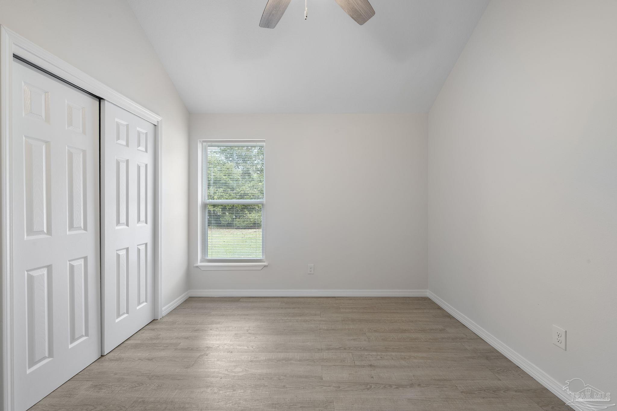 1039 Isabella Road Cantonment, FL 32533 - Photo 21 of 37 a view of a room that has a window in it