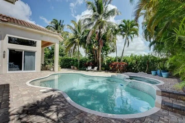 a view of outdoor space yard and swimming pool