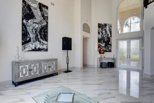 a view of a entryway with stairs and a couch