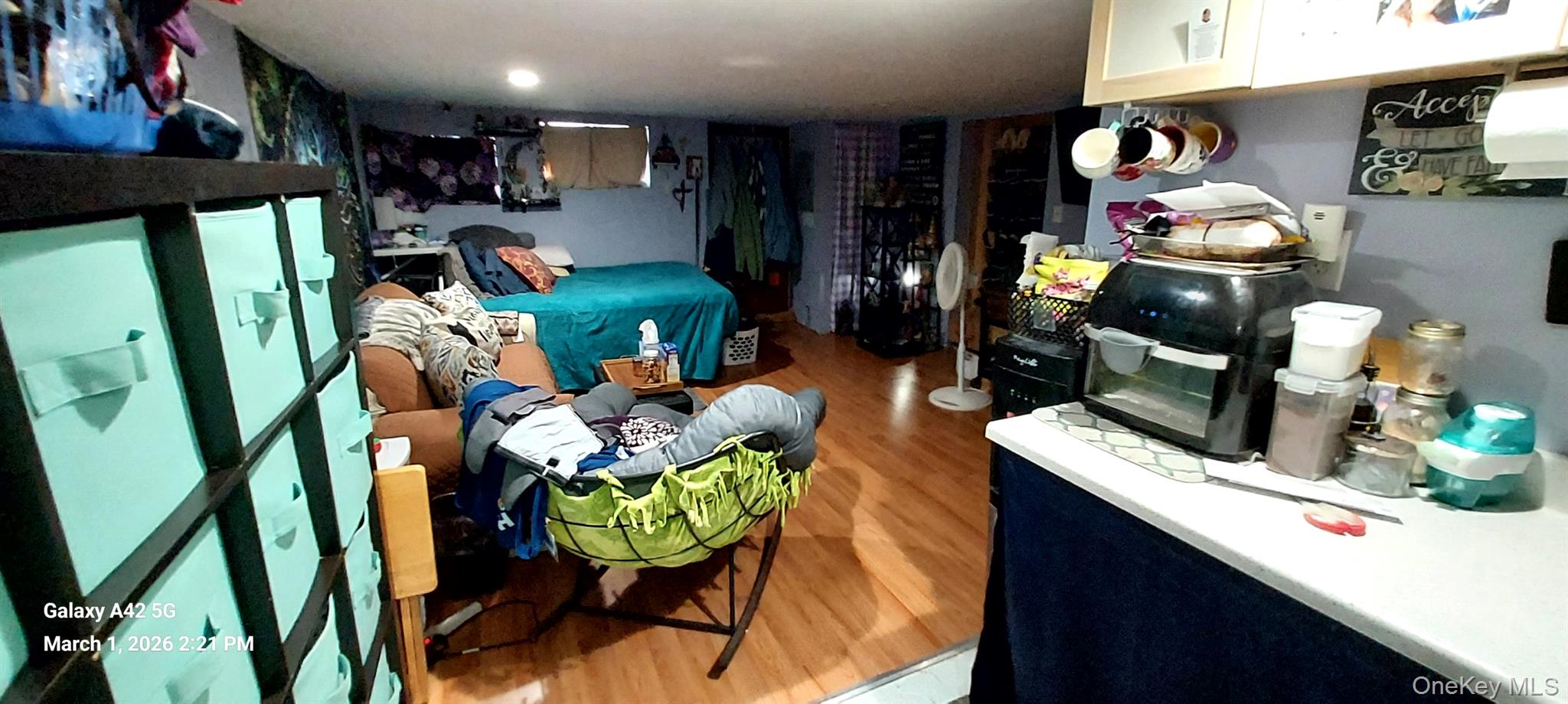 120 Stackyard Drive Mastic Beach, NY 11951 - Photo 12 of 17 a living room filled with furniture and a couch