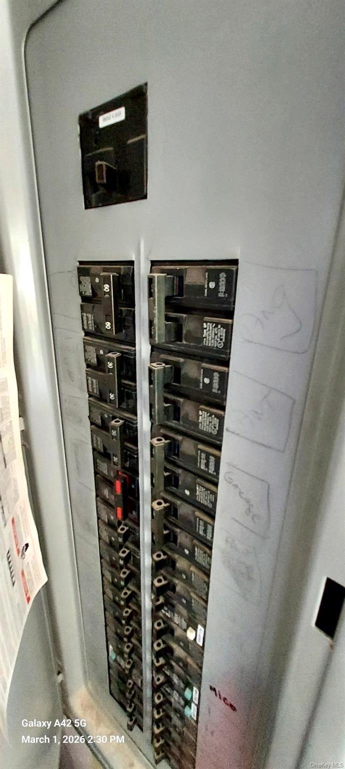 120 Stackyard Drive Mastic Beach, NY 11951 - Photo 17 of 17 a close up view of electric board