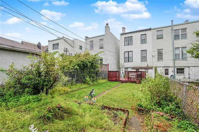 a bathroom with a sink a toilet and shower curtain