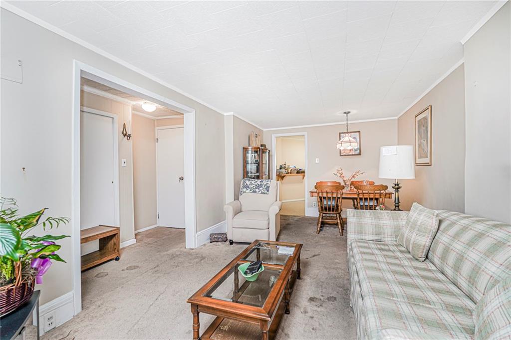 329 80th Street Brooklyn, NY 11209 - Photo 10 of 34 a living room with furniture and wooden floor