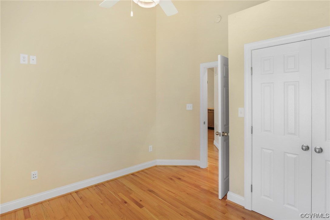 740 Marsh Pungo Road, Unit 8 Locust Hill, VA 23092 - Photo 20 of 50 a view of an empty room with wooden floor