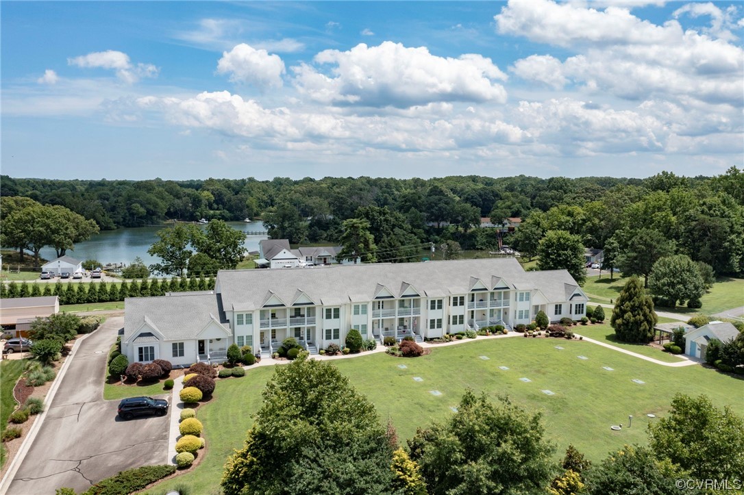740 Marsh Pungo Road, Unit 8 Locust Hill, VA 23092 - Photo 2 of 50 an aerial view of residential houses with outdoor space and swimming pool