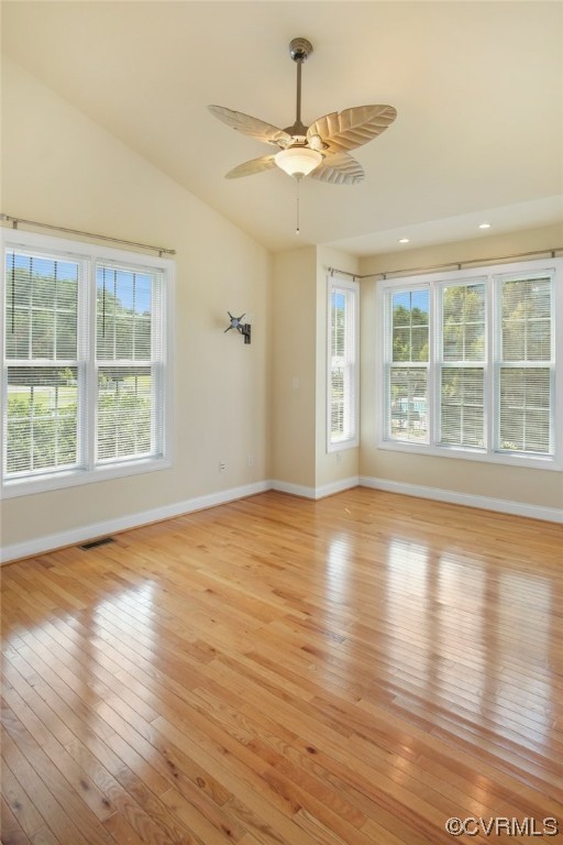 740 Marsh Pungo Road, Unit 8 Locust Hill, VA 23092 - Photo 21 of 50 a view of an empty room with wooden floor and a window