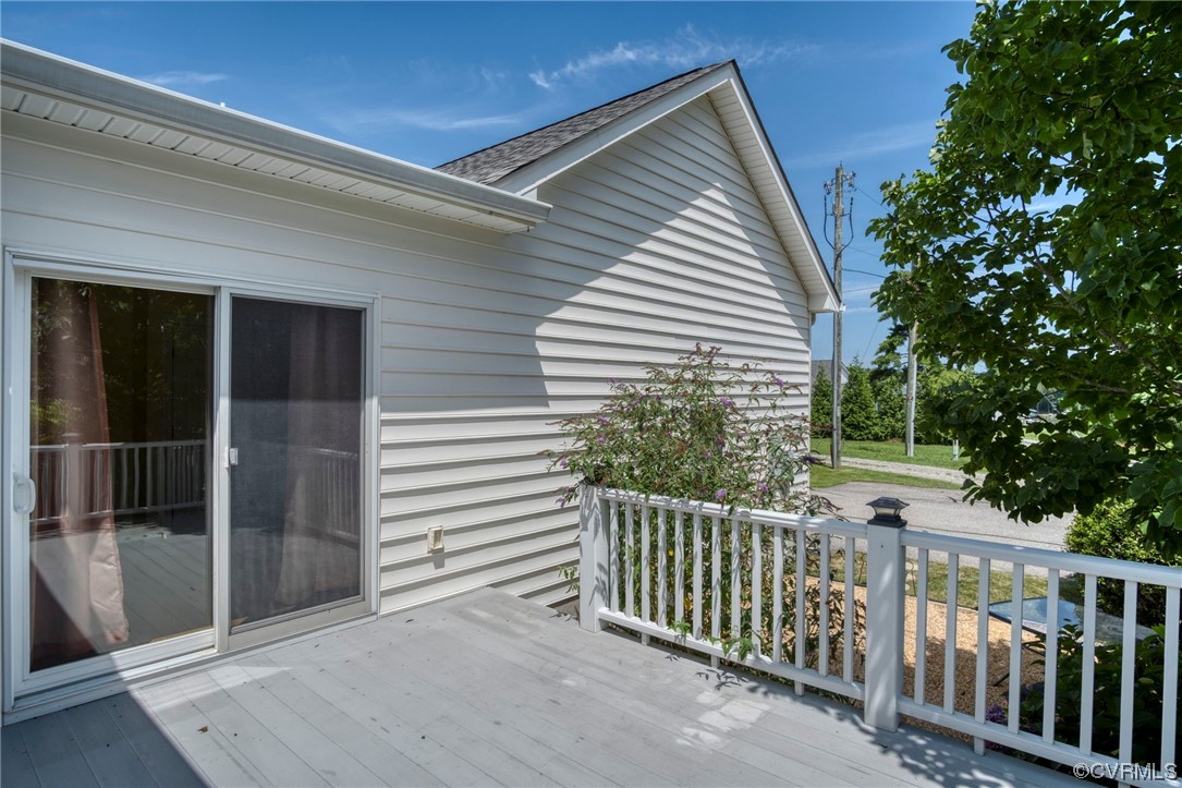 740 Marsh Pungo Road, Unit 8 Locust Hill, VA 23092 - Photo 36 of 50 a view of a house with a balcony