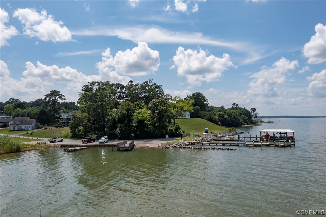 740 Marsh Pungo Road, Unit 8 Locust Hill, VA 23092 - Photo 40 of 50 a view of a swimming pool with outdoor seating