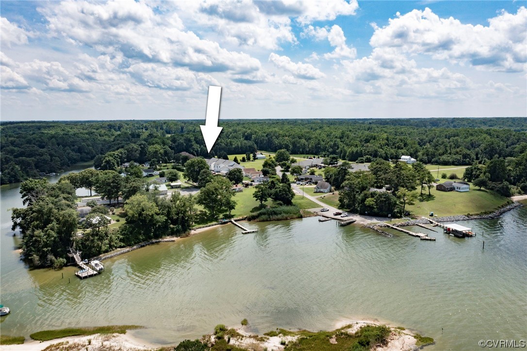 740 Marsh Pungo Road, Unit 8 Locust Hill, VA 23092 - Photo 44 of 50 an aerial view of a houses with a lake view