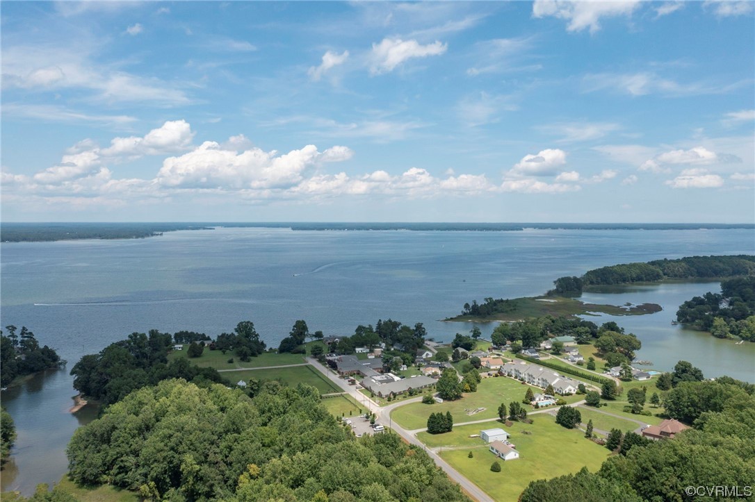 740 Marsh Pungo Road, Unit 8 Locust Hill, VA 23092 - Photo 50 of 50 a view of a lake with lots of green space