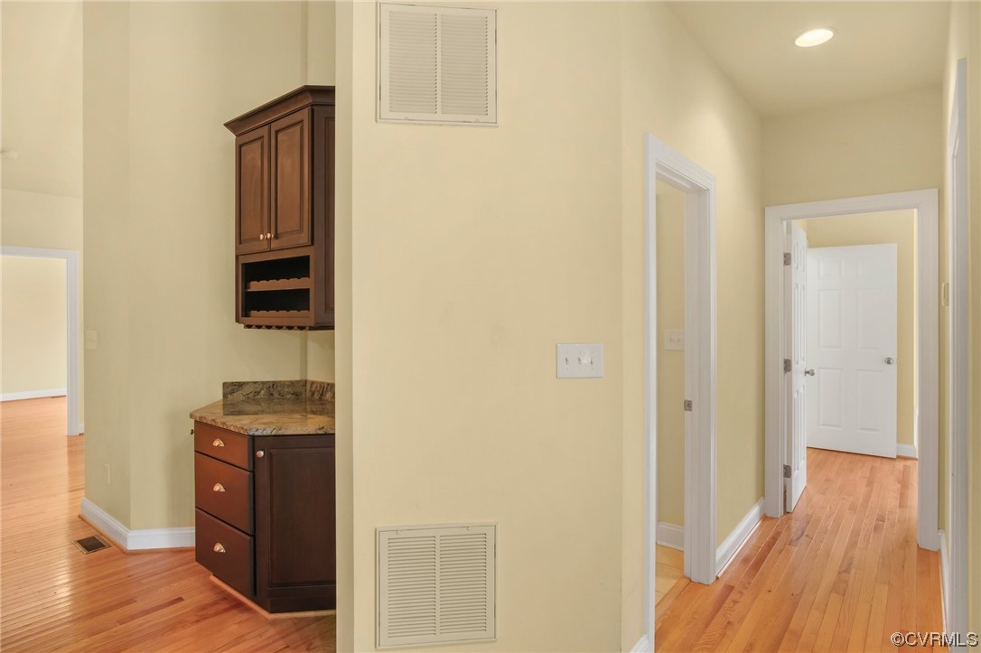 740 Marsh Pungo Road, Unit 8 Locust Hill, VA 23092 - Photo 8 of 50 a view of hallway with wooden floor