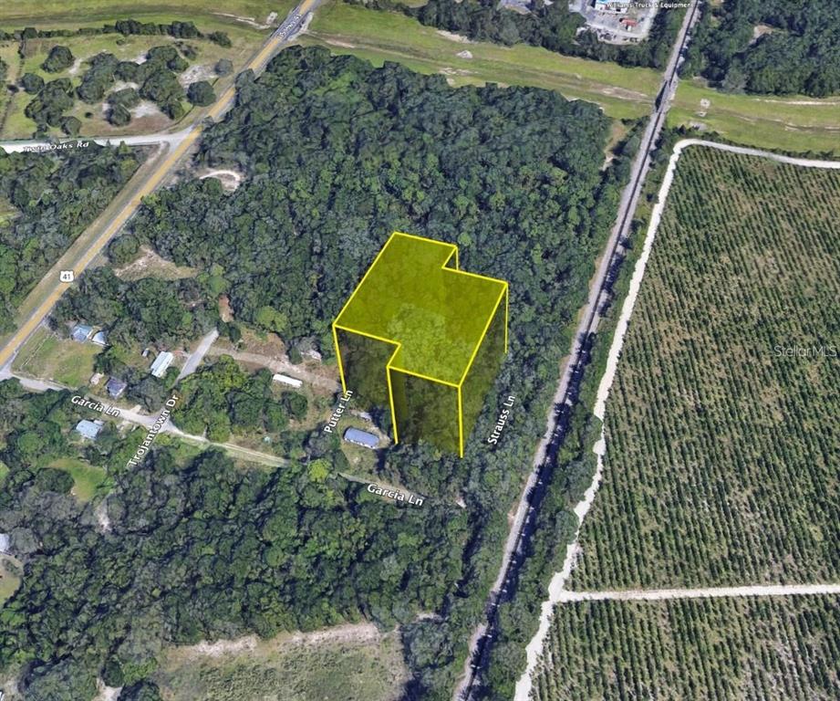 17314 Putter Lane Spring Hill, FL 34610 - Photo 2 of 9 a bird view of a house