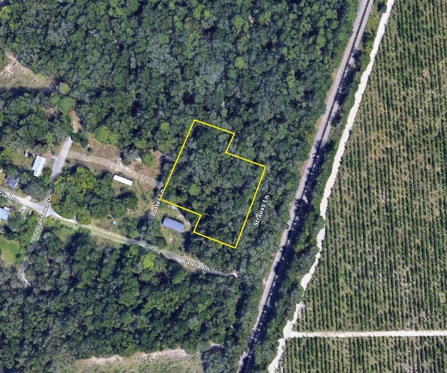 17314 Putter Lane Spring Hill, FL 34610 - Photo 3 of 9 a bird view of a house