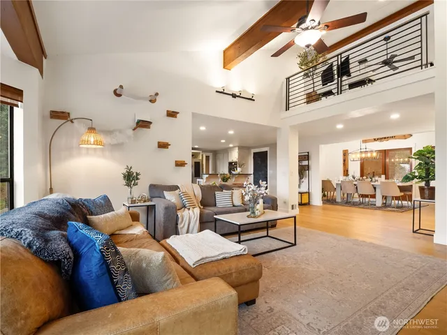 a spacious bedroom with a bed and a table