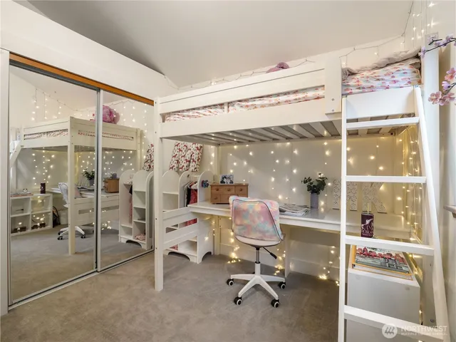 a view of a living room with furniture