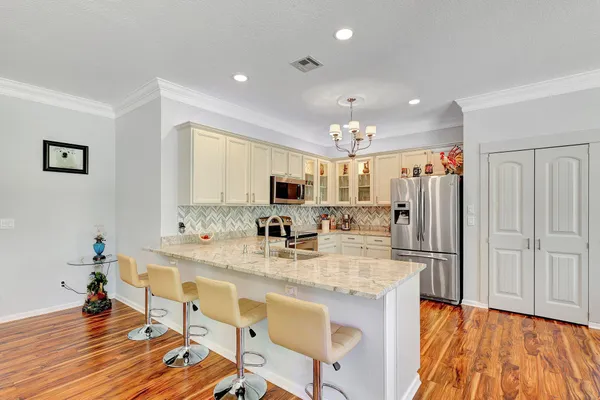 $595,900 | 5496 Southwest Gray Fox Drive, Palm City, FL 34990