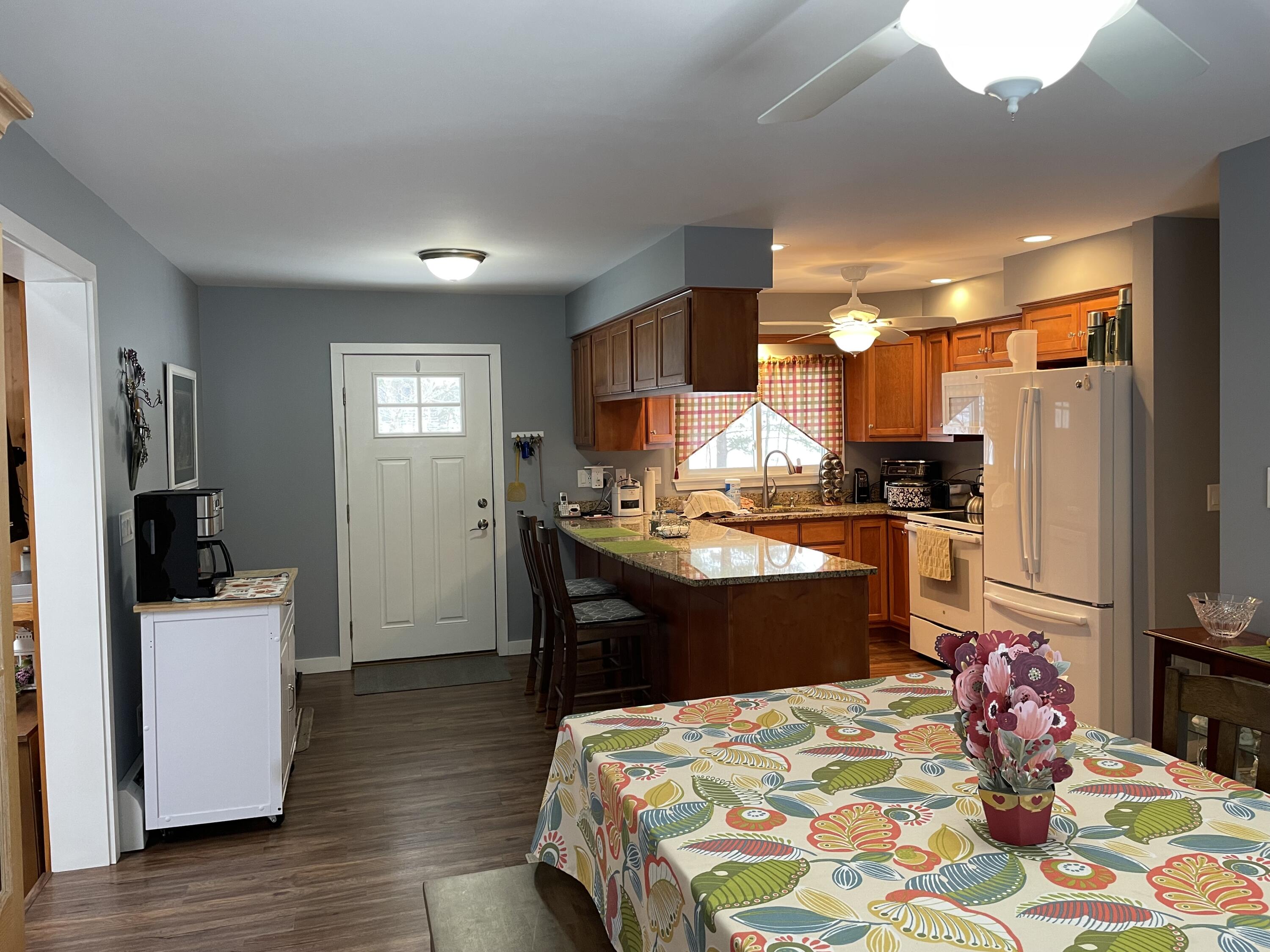 662 Greenwoods Road Peru, ME 04290 - Photo 22 of 46 DR / Kitchen / Back Door