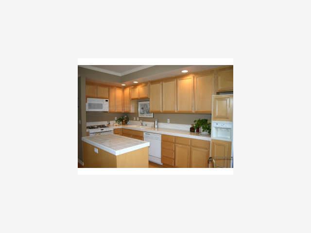 600 Willow Road, Unit 11 Menlo Park, CA 94025 - Photo 2 of 9 a open kitchen with granite countertop a sink and cabinets
