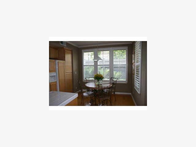 600 Willow Road, Unit 11 Menlo Park, CA 94025 - Photo 5 of 9 a bathroom with a sink and a large mirror