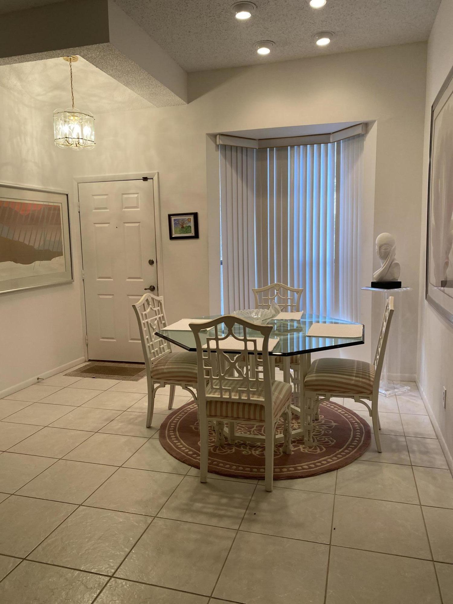 7472 La Paz Boulevard, Unit 308 Boca Raton, FL 33433 - Photo 1 of 22 Entrance and dining Space
