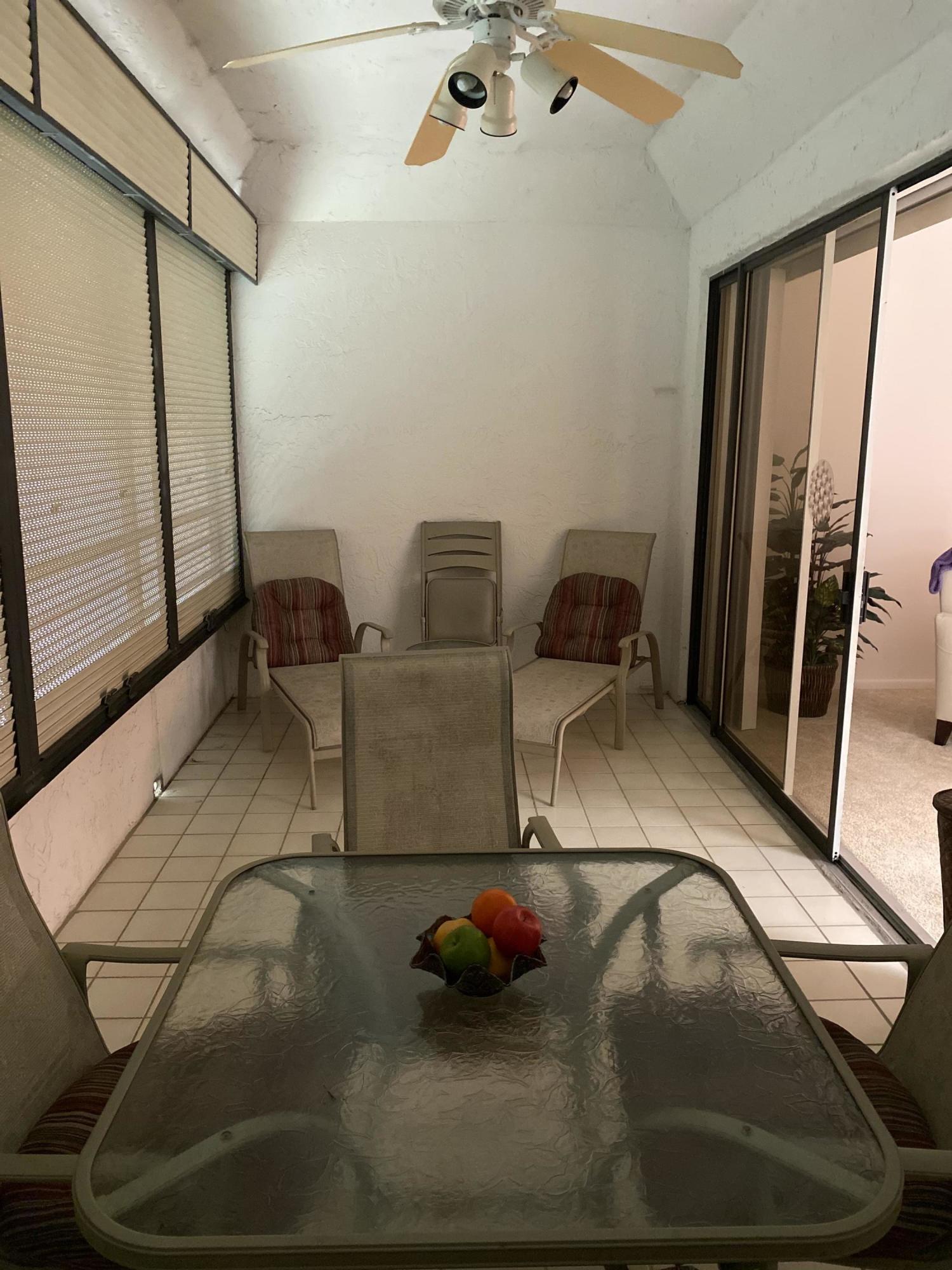 7472 La Paz Boulevard, Unit 308 Boca Raton, FL 33433 - Photo 20 of 22 Enclosed Porch