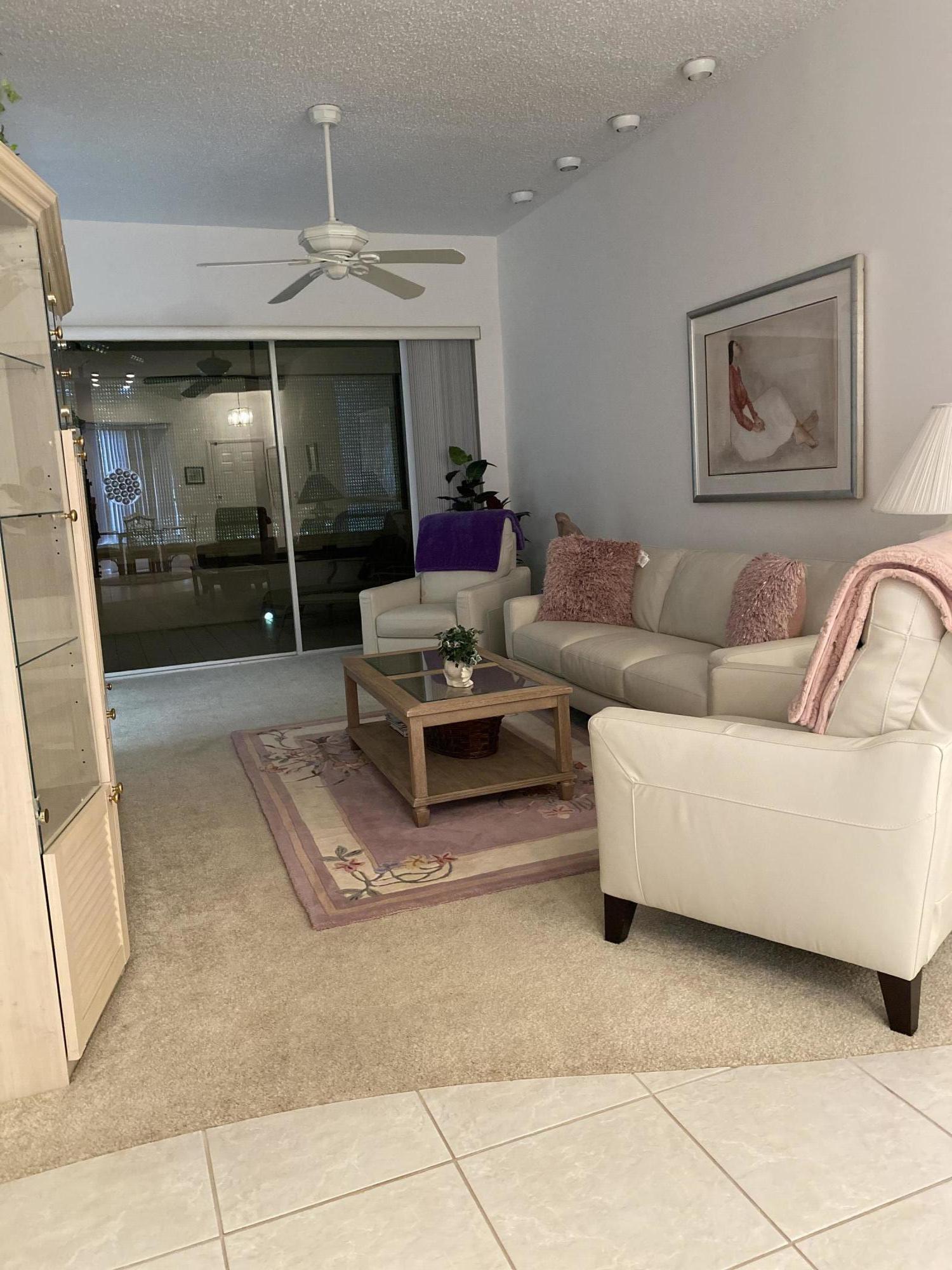 7472 La Paz Boulevard, Unit 308 Boca Raton, FL 33433 - Photo 2 of 22 Living room view front door