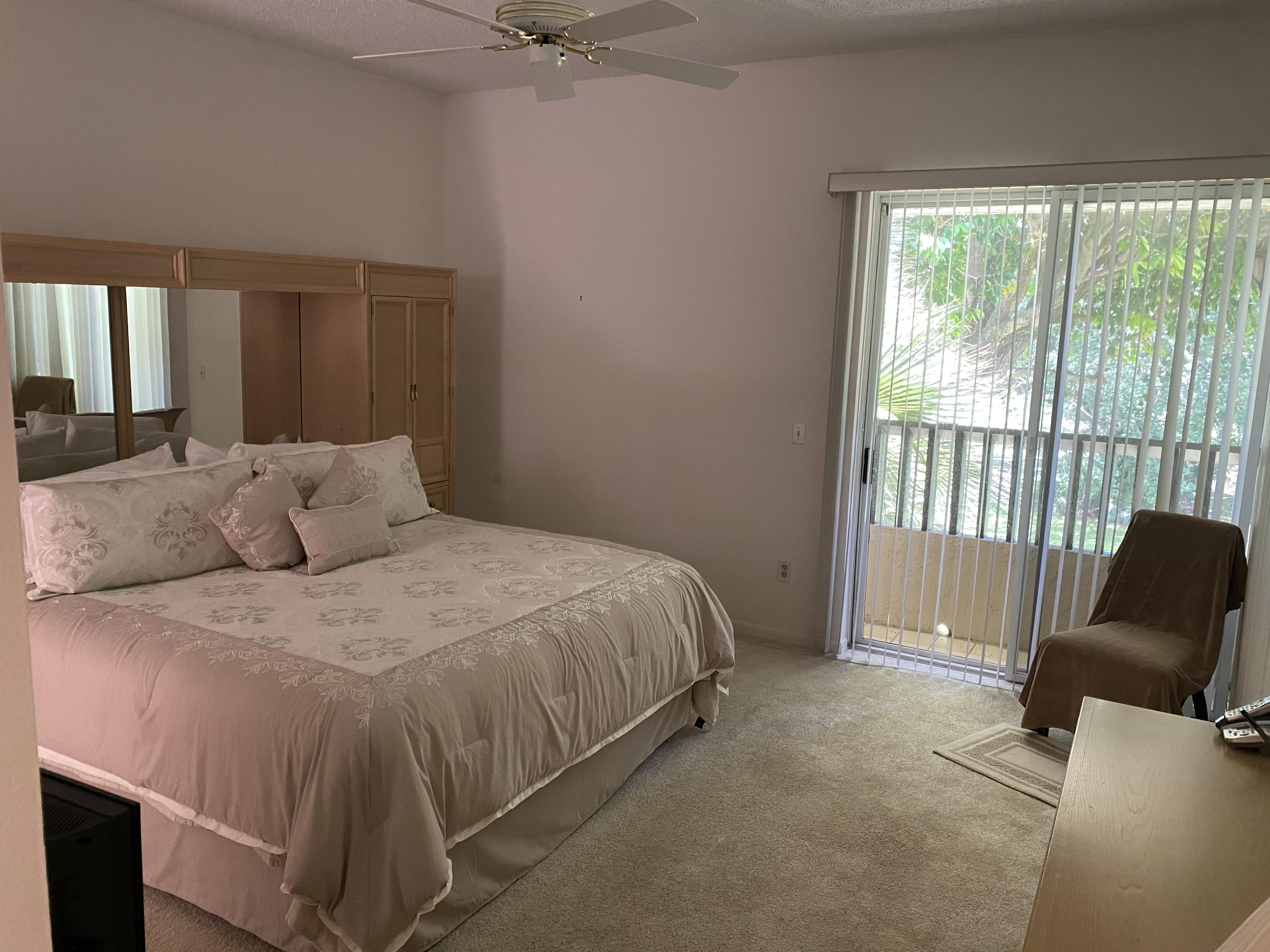 7472 La Paz Boulevard, Unit 308 Boca Raton, FL 33433 - Photo 4 of 22 Master Bedroom View 2