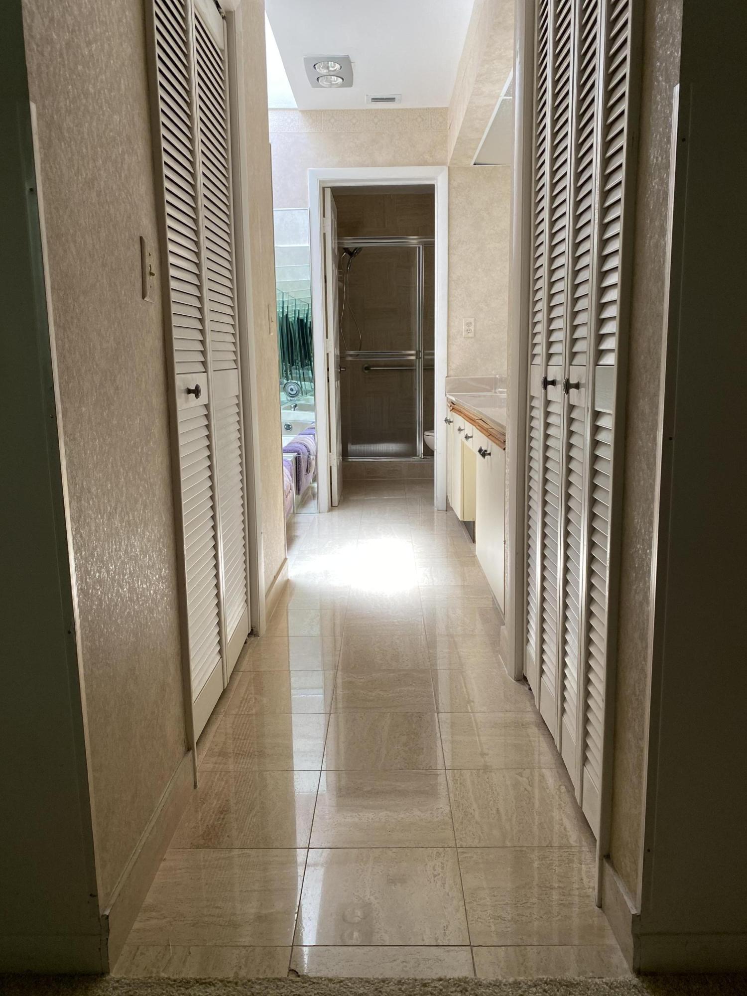 7472 La Paz Boulevard, Unit 308 Boca Raton, FL 33433 - Photo 5 of 22 En Suite Master Bathroom