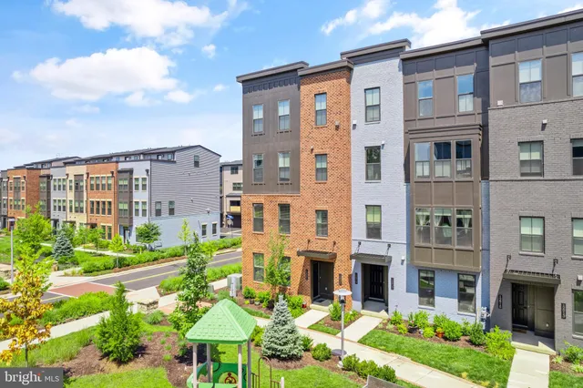 a front view of a multi story residential apartment building