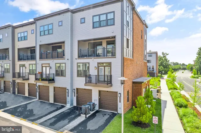 a front view of a multi story residential apartment building