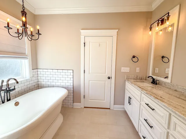 an empty room with wooden floor and closet