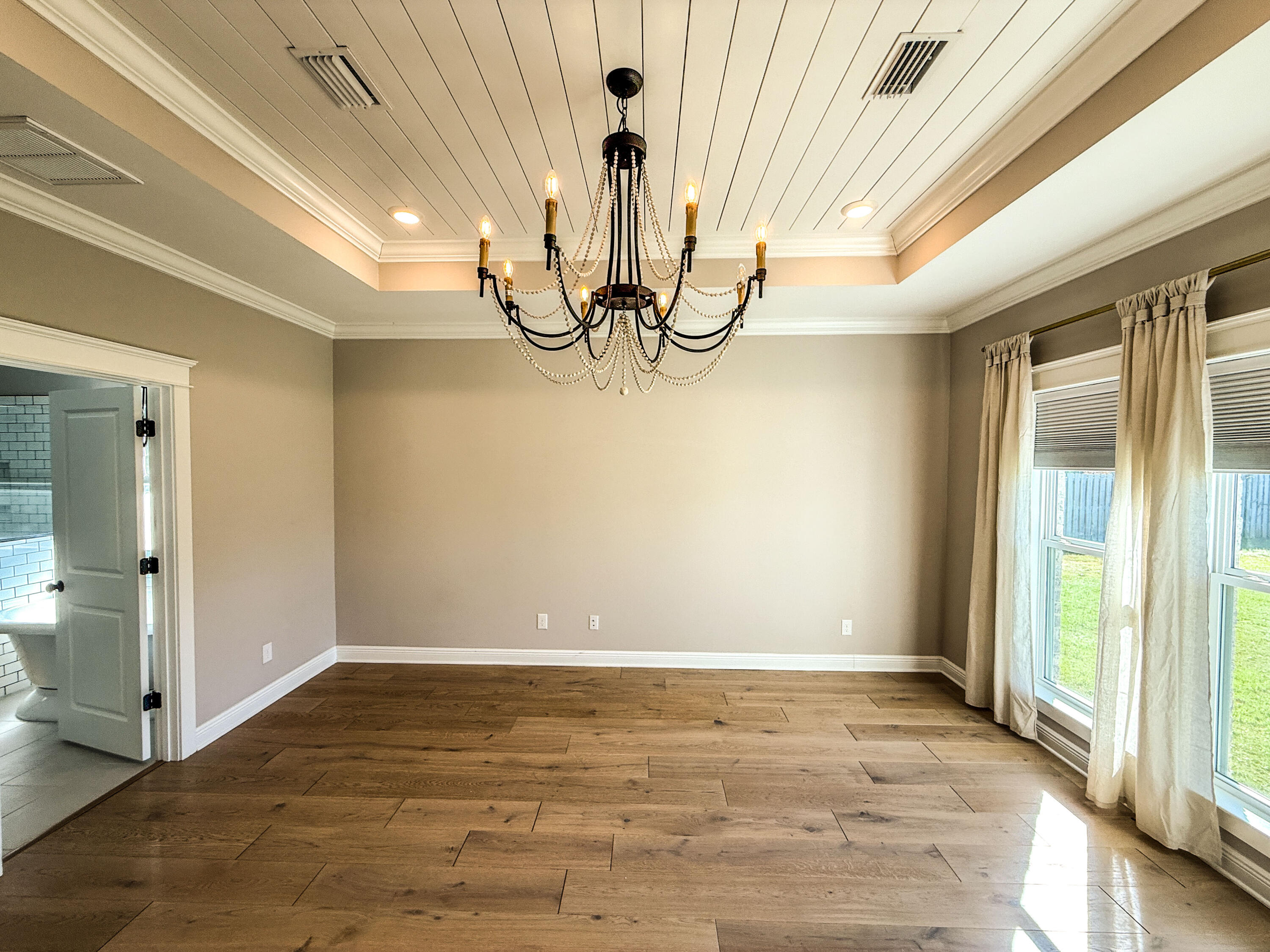 79 Mill Pond Cove Freeport, FL 32439 - Photo 16 of 63 a view of a livingroom with wooden floor and windows