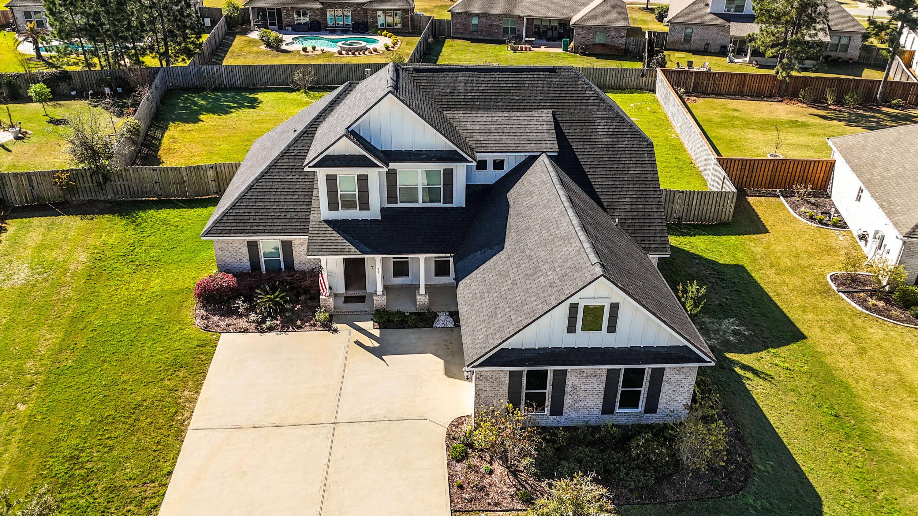 79 Mill Pond Cove Freeport, FL 32439 - Photo 26 of 63 a aerial view of a house with swimming pool