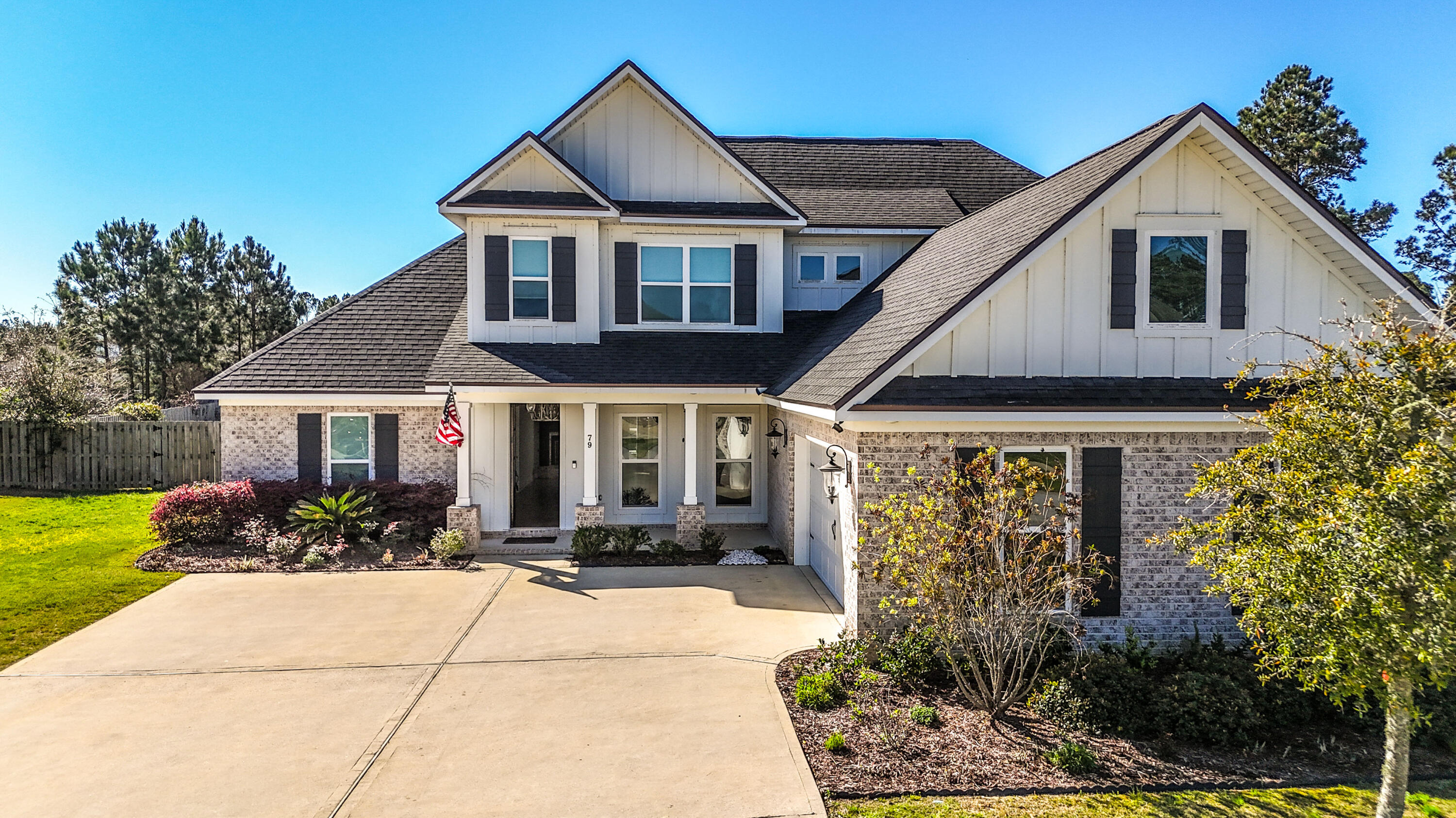 79 Mill Pond Cove Freeport, FL 32439 - Photo 7 of 63 a front view of a house with garden