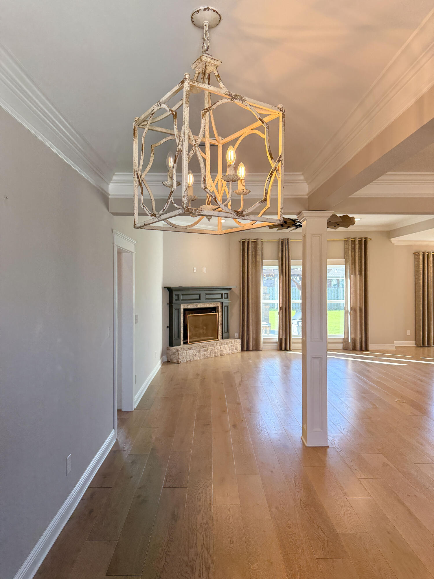 79 Mill Pond Cove Freeport, FL 32439 - Photo 10 of 63 a view of a livingroom with wooden floor a fireplace