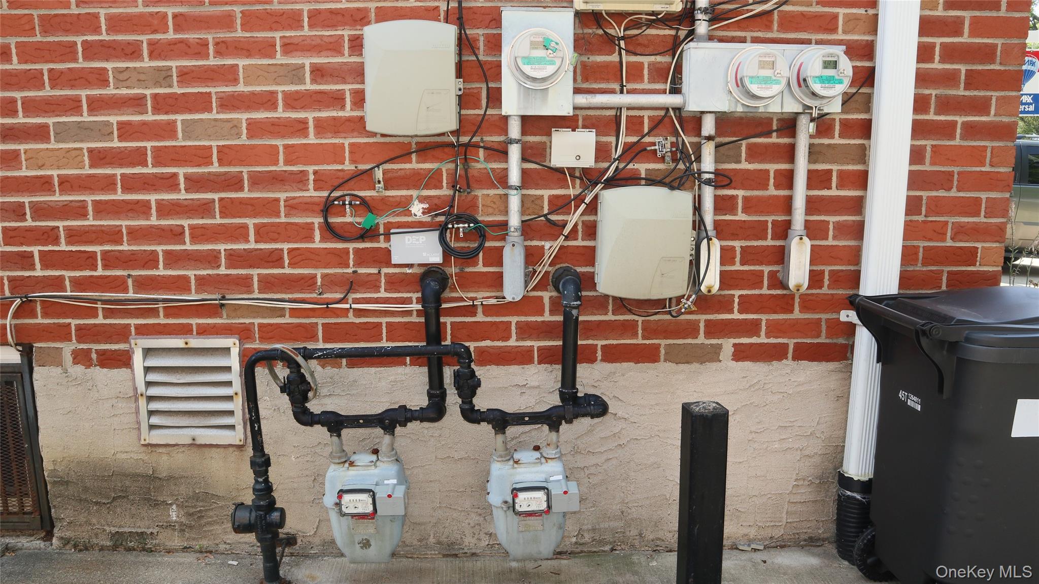 206-16 45th Road Queens, NY 11361 - Photo 2 of 12 a bathroom with a sink and a shower