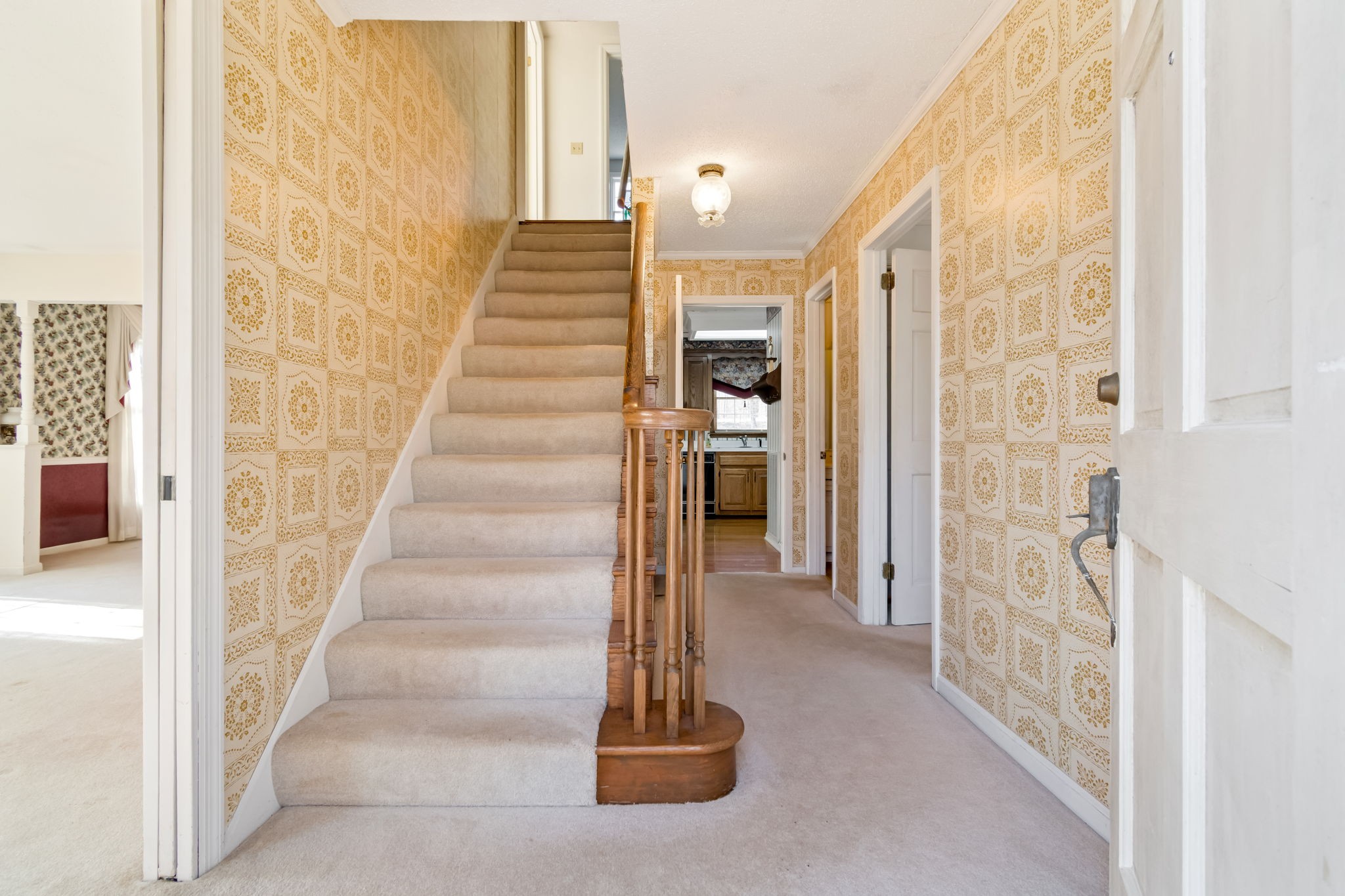 846 R Wilkerson Drive Centerville, TN 37033 - Photo 30 of 68 a view of a hallway with wooden floor and staircase