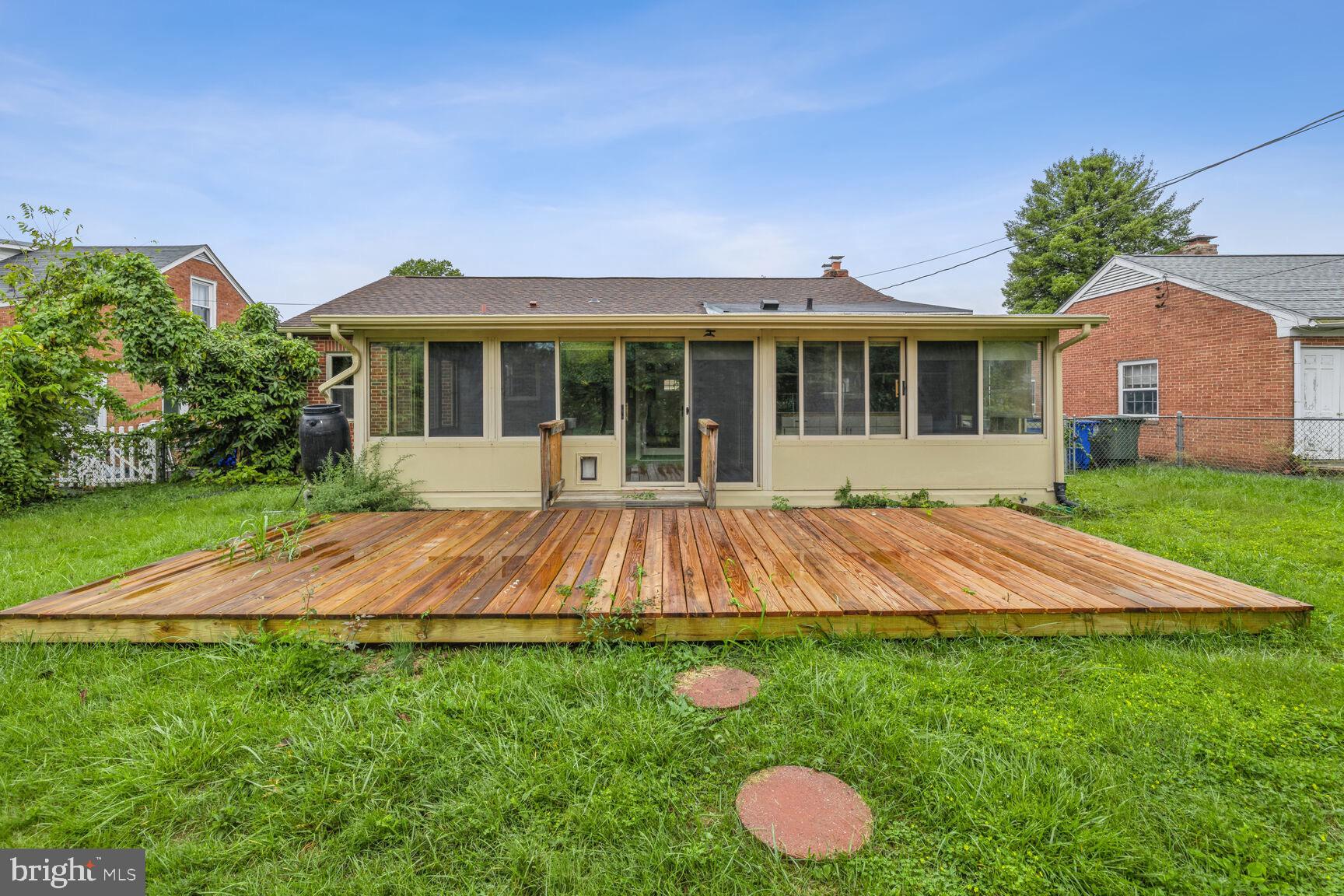 606 Biggs Avenue Frederick, MD 21702 - Photo 19 of 20 a view of an house with backyard outdoor and garden