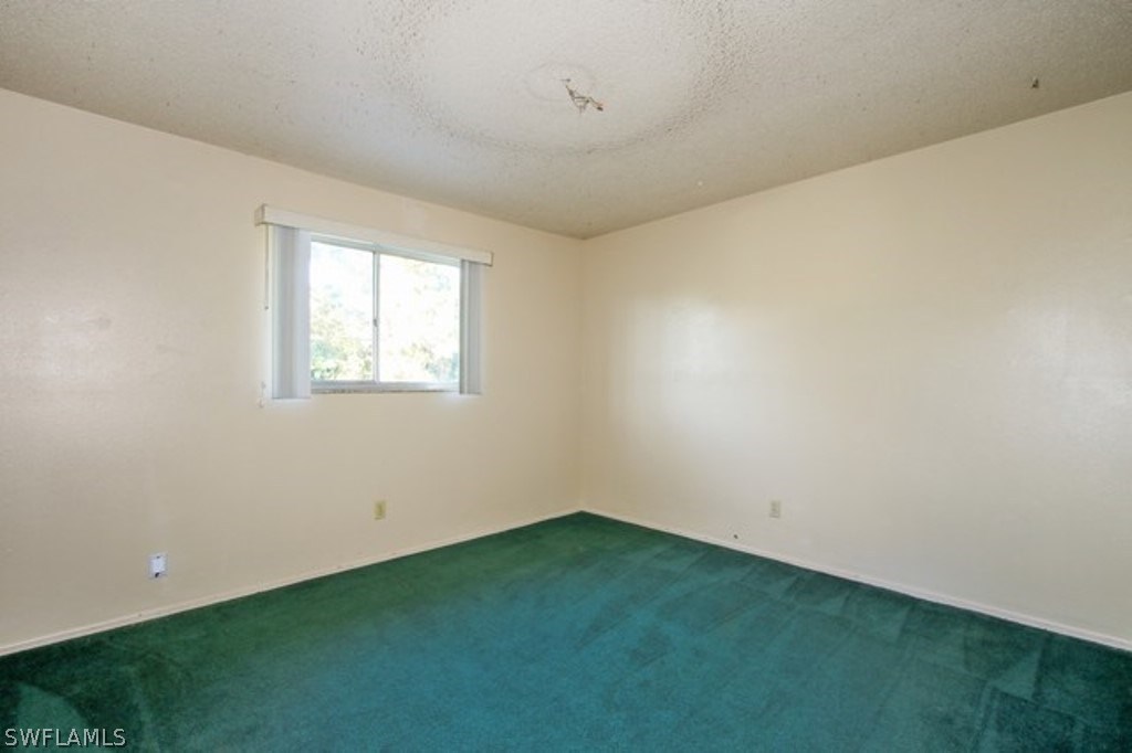 8070 Matanzas Road Fort Myers, FL 33967 - Photo 17 of 25 an empty room with a window